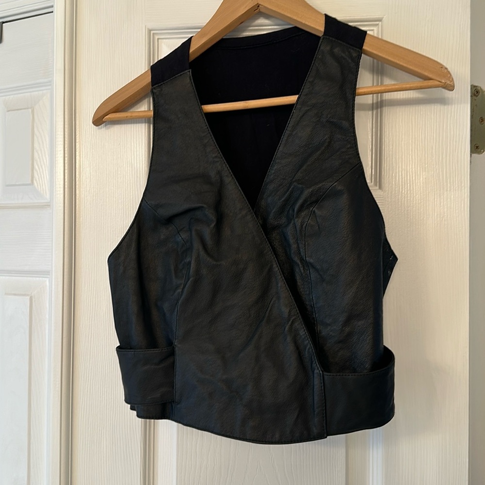 Unbranded, real leather snap wrap vest.